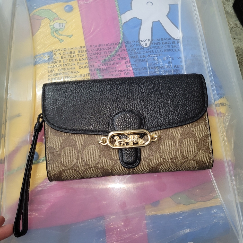 Coach Black and Tan Wristlet larger size new with tags see pics signature logo